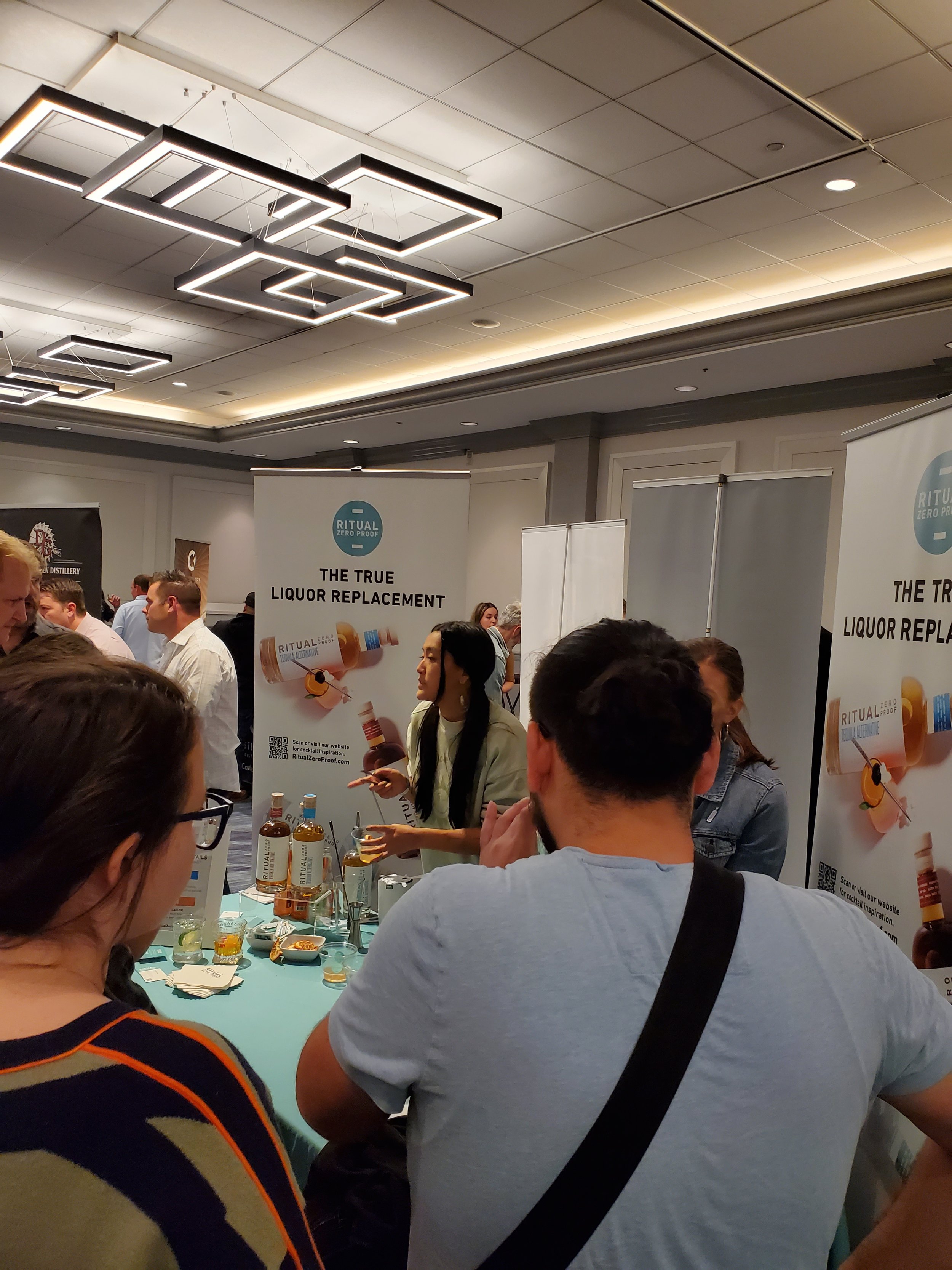    Ritual Zero Proof Rum   's busy booth  